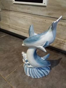 Décoration : sculpture sur bois de deux dauphins
